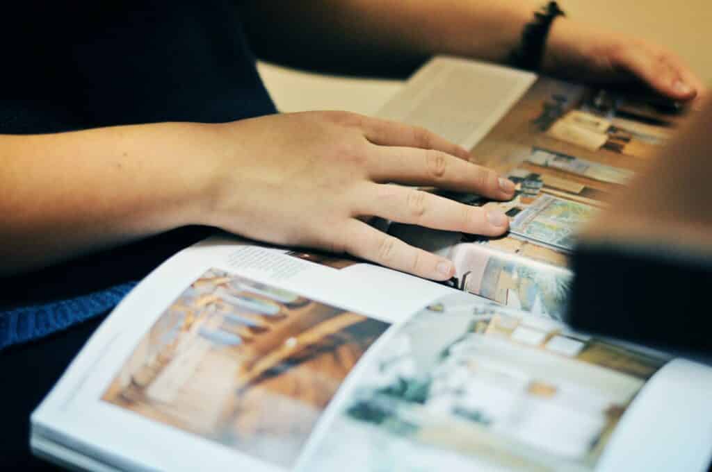 hands and journal / magazine